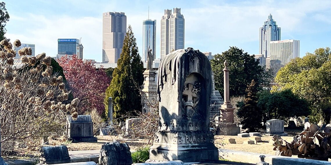 Oakland Cemetery with the Atlanta skyline beyond | atlantaandbeyond.com