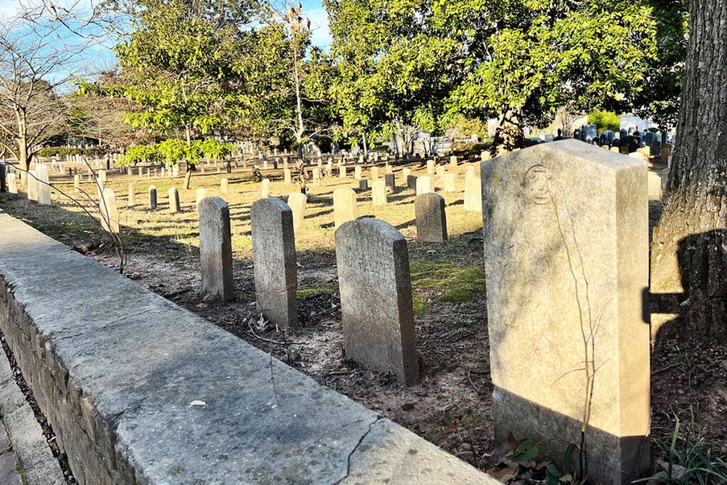 The rounded headstones belong to Union soldiers who remain at Oakland Cemetery in Atlanta | atlantaandbeyond.com