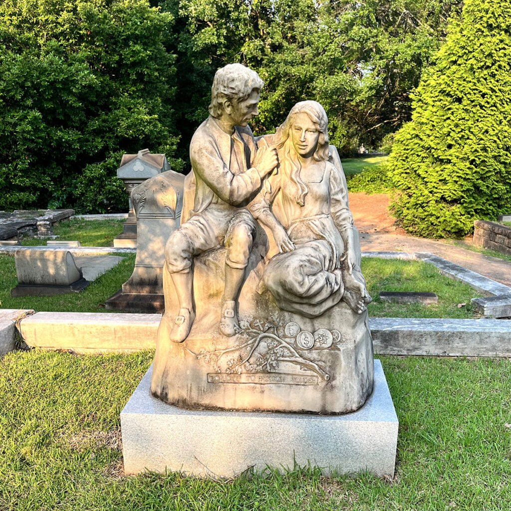 The Fazzari-Landis Family Monument features a beautiful sculpture of a husband brushing his wife’s hair | atlantaandbeyond.com