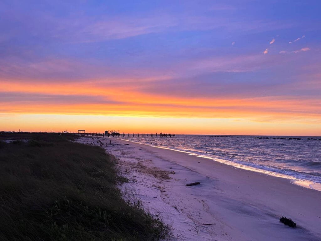 The Mississippi Sound at sunset on Dauphin Island AL | atlantaandbeyond.com